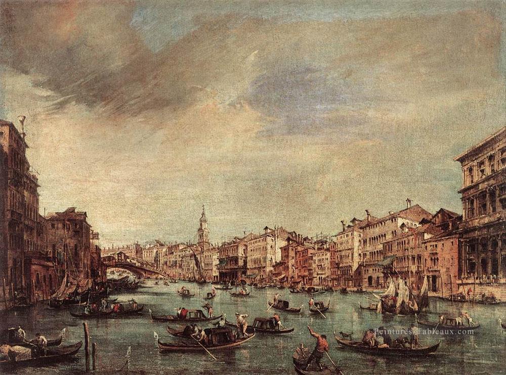 Le Grand Canal en regardant vers le pont du Rialto école vénitienne Francesco Guardi Peintures à l'huile